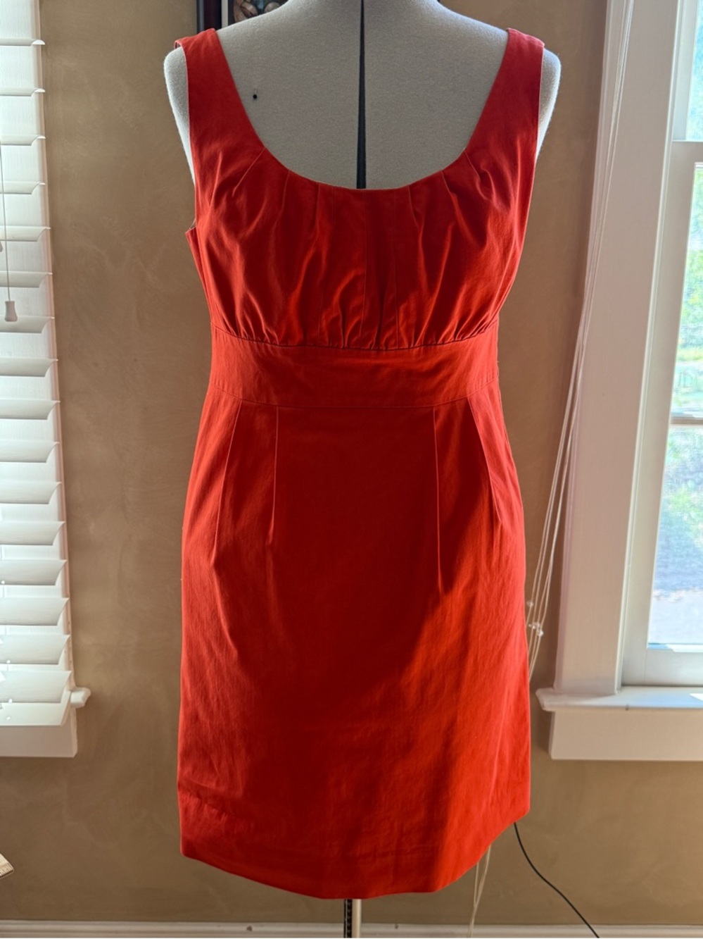 Classic Sleeveless Orange Sheath Dress with pleated bodice